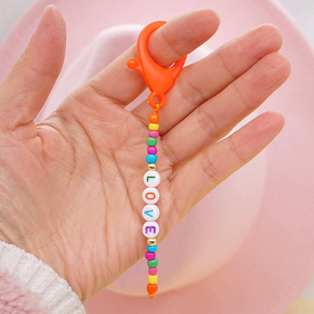 Factory direct supply handmade beaded mobile phone lanyard bluetooth speaker lanyard flashlight fan selfie stick U disk sling