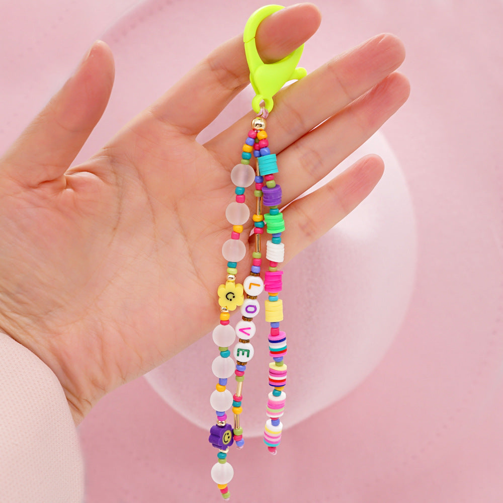 Factory direct supply handmade beaded mobile phone lanyard bluetooth speaker lanyard flashlight fan selfie stick U disk sling