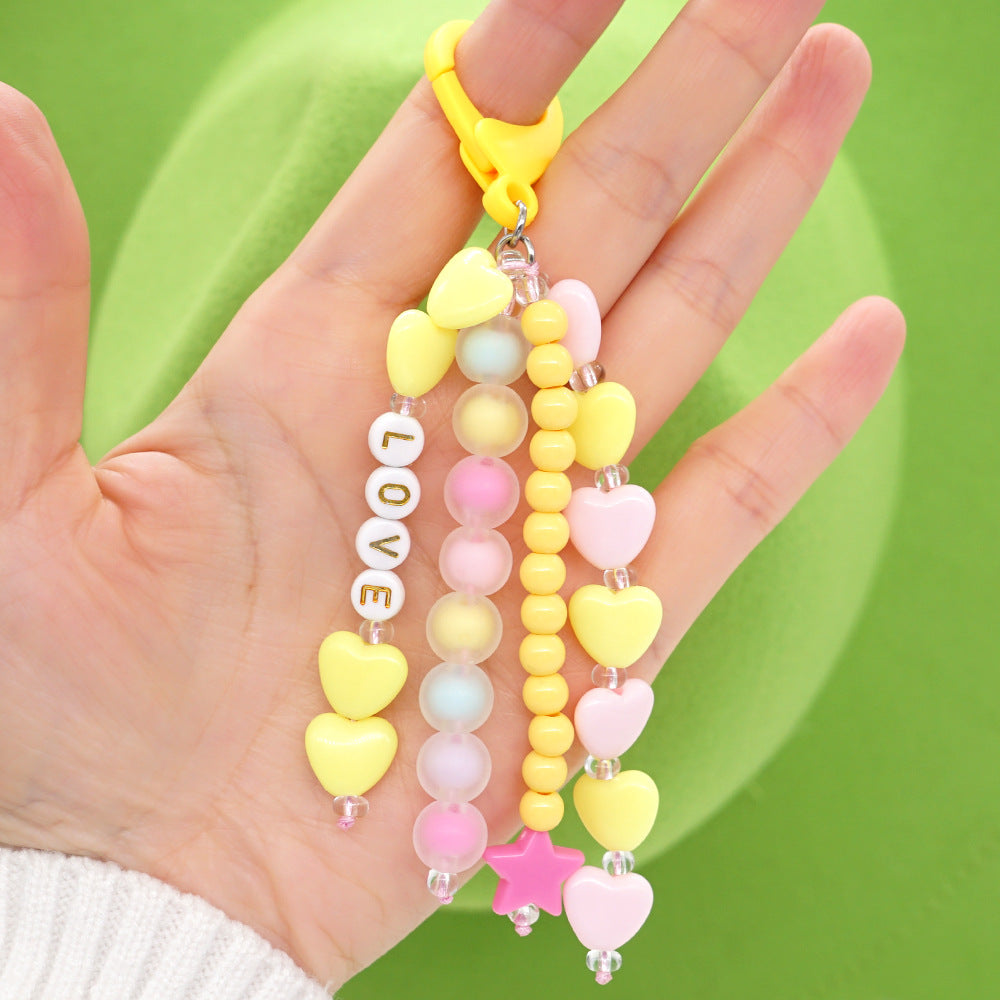 Factory direct supply handmade beaded mobile phone lanyard bluetooth speaker lanyard flashlight fan selfie stick U disk sling